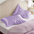 A pair of solid colour satin cloth pillowcases made from polyester, shown in one of thirteen available shades.