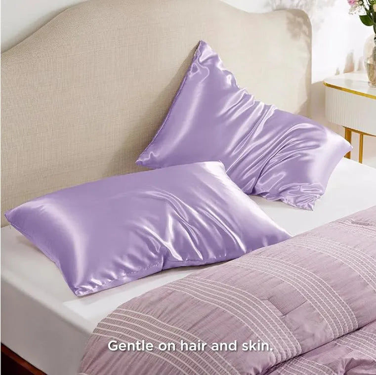 A pair of solid colour satin cloth pillowcases made from polyester, shown in one of thirteen available shades.