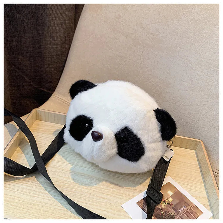 Panda head plush crossbody bag with cylindrical shape and sandwich pocket measuring 18cm