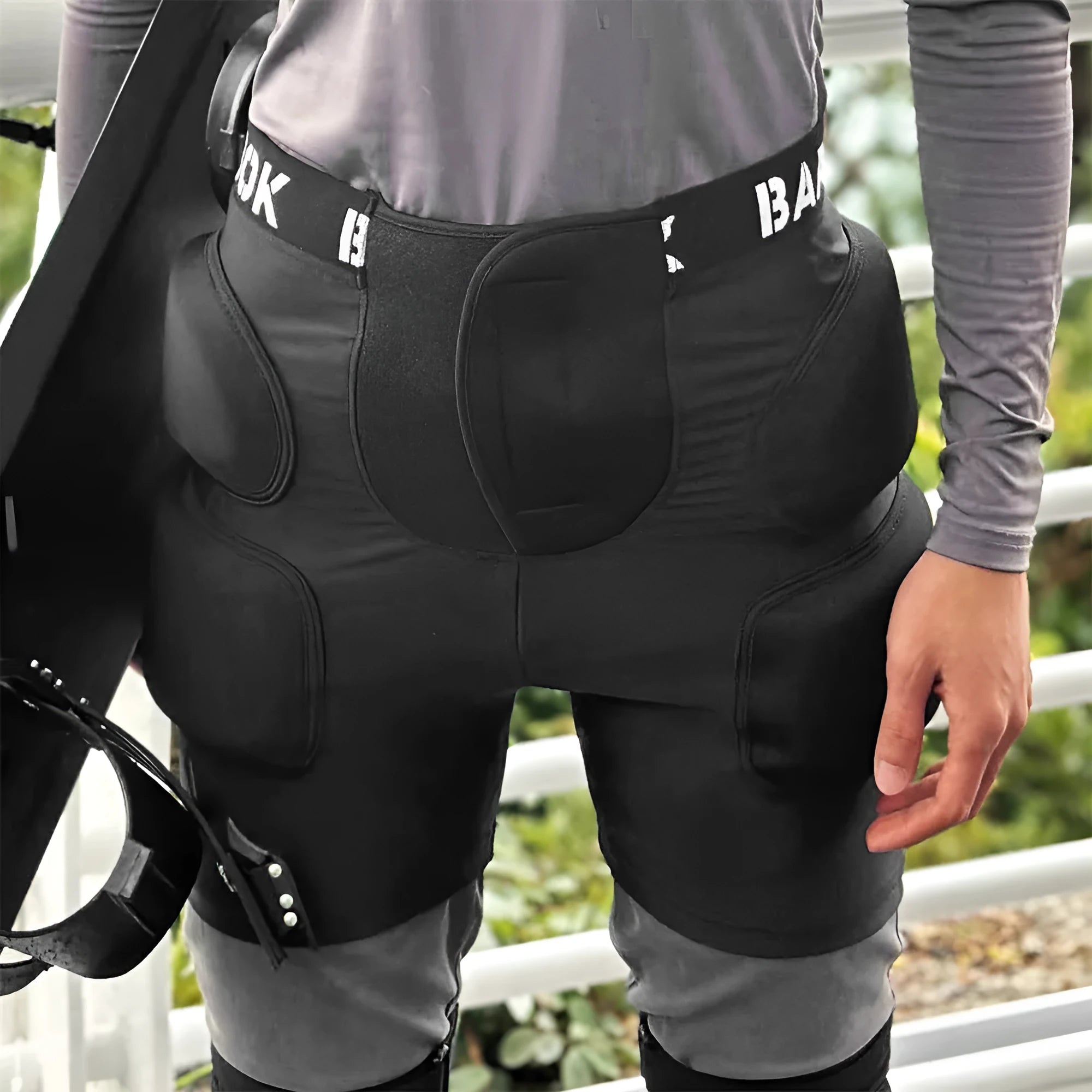 Black roller skating hip pad pants made from spandex and NBR foam for fall protection