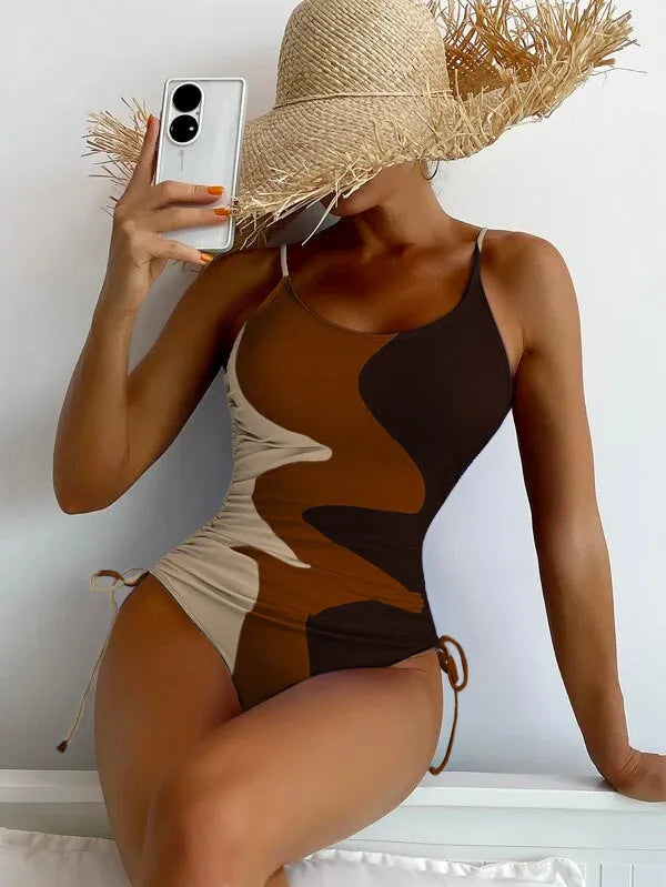 Women's sleeveless backless one-piece swimsuit in nylon spandex fabric available in blue, purple, brown, green colours