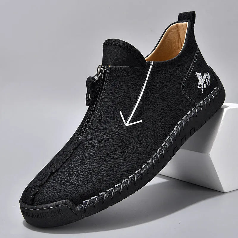 Men's black casual zip-up Martin boots with round toe and low heel on a white background.