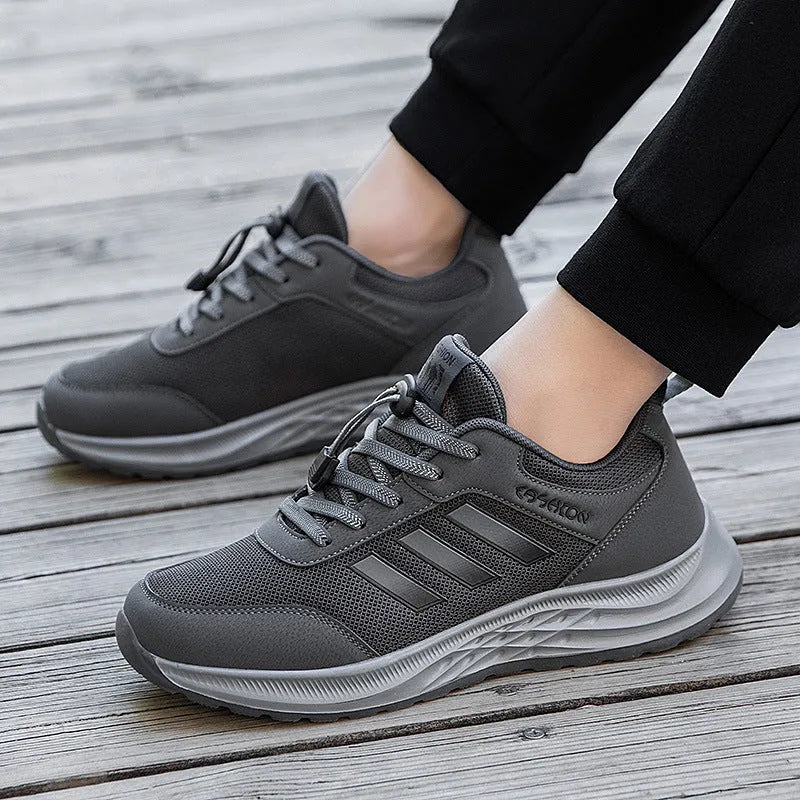 Adult unisex breathable mesh slip-on shoes in black, purple, and dark grey with an elastic band.