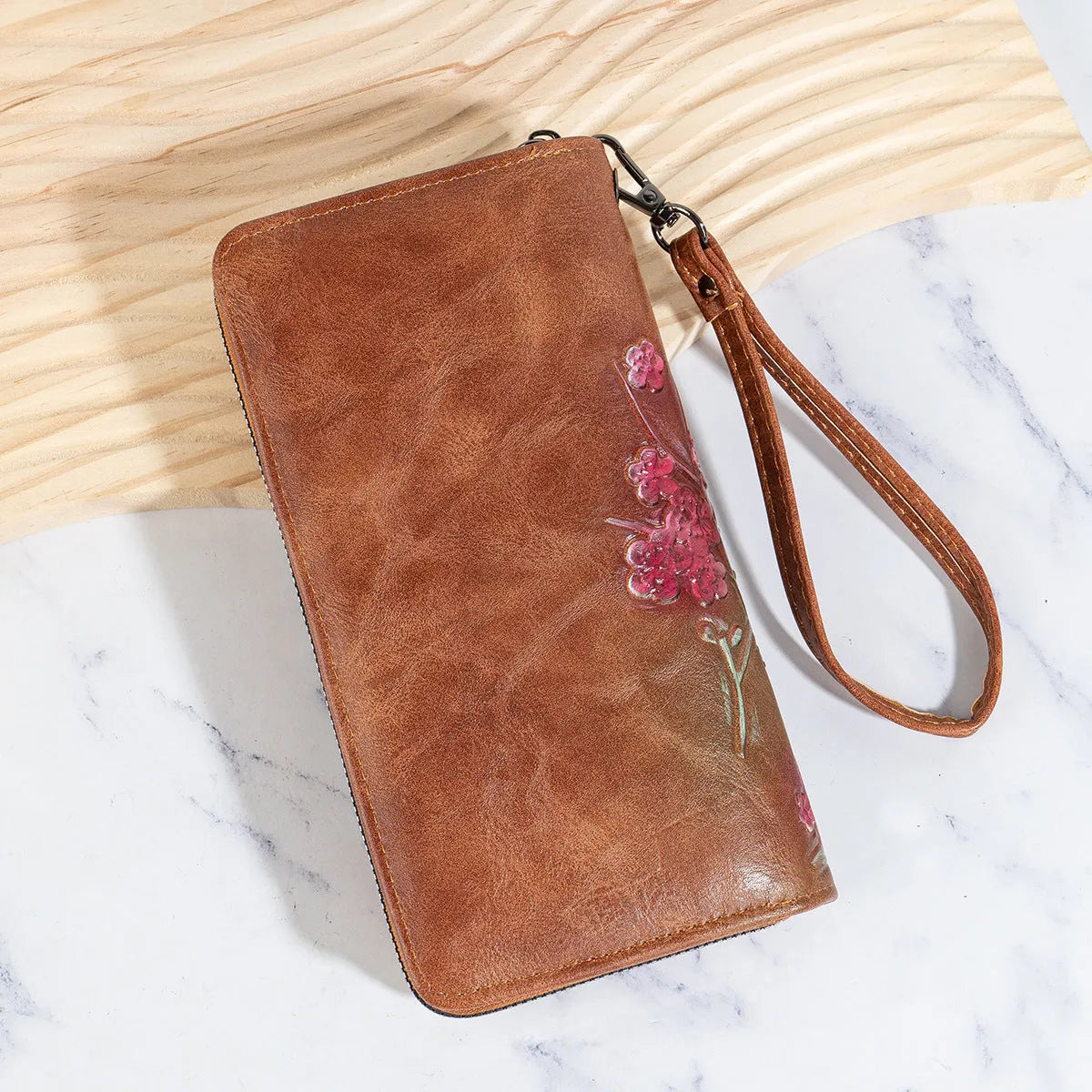 Embossed Chinese style handbag with floral pattern and hand-painted design in brown colour