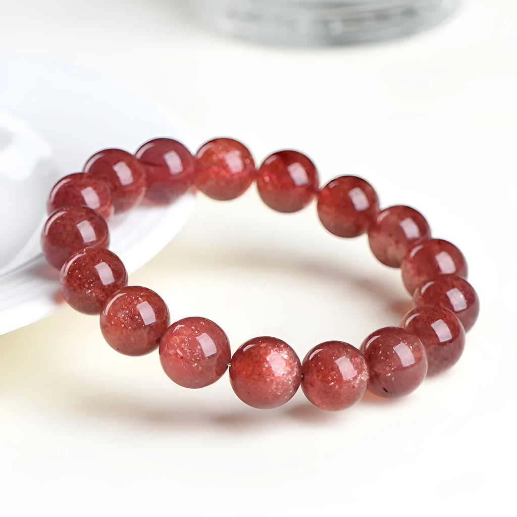 Natural strawberry quartz bracelet with geometric beads in starlight cherry red colour showing three bead size options