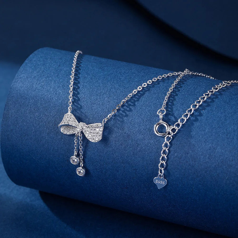 S925 sterling silver bow pendant necklace on adjustable O-ring chain