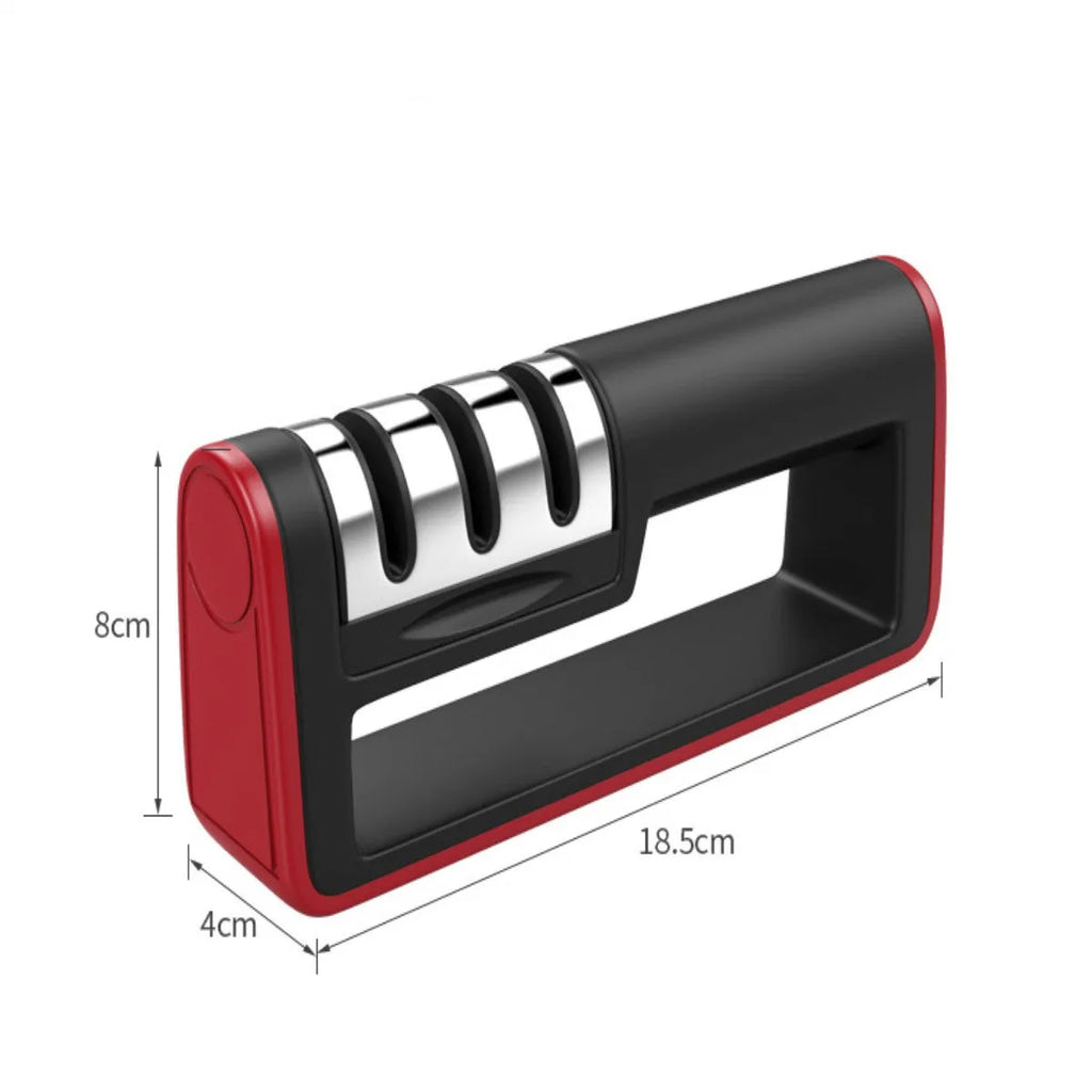 Black and red three-stage knife sharpener with non-skid rubber feet on a worktop
