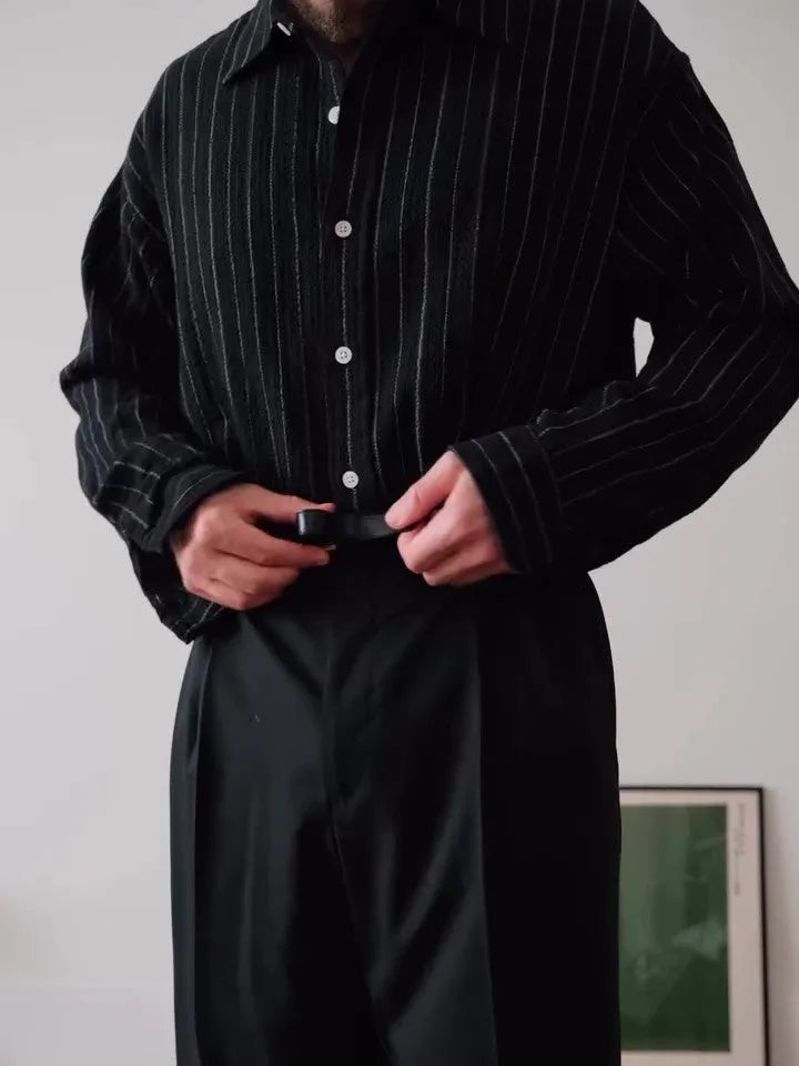 Men's black pinstripe polyester button-down shirt with regular fit on a hanger.