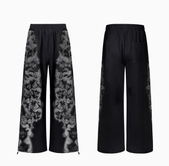 Street trendy printed loose three-piece clothing set showing trousers, hoodie, and seven-inch pants in polyester fabric.