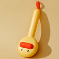 Yellow duck-shaped pet comb with open-section design and floating needle teeth for cat and dog grooming