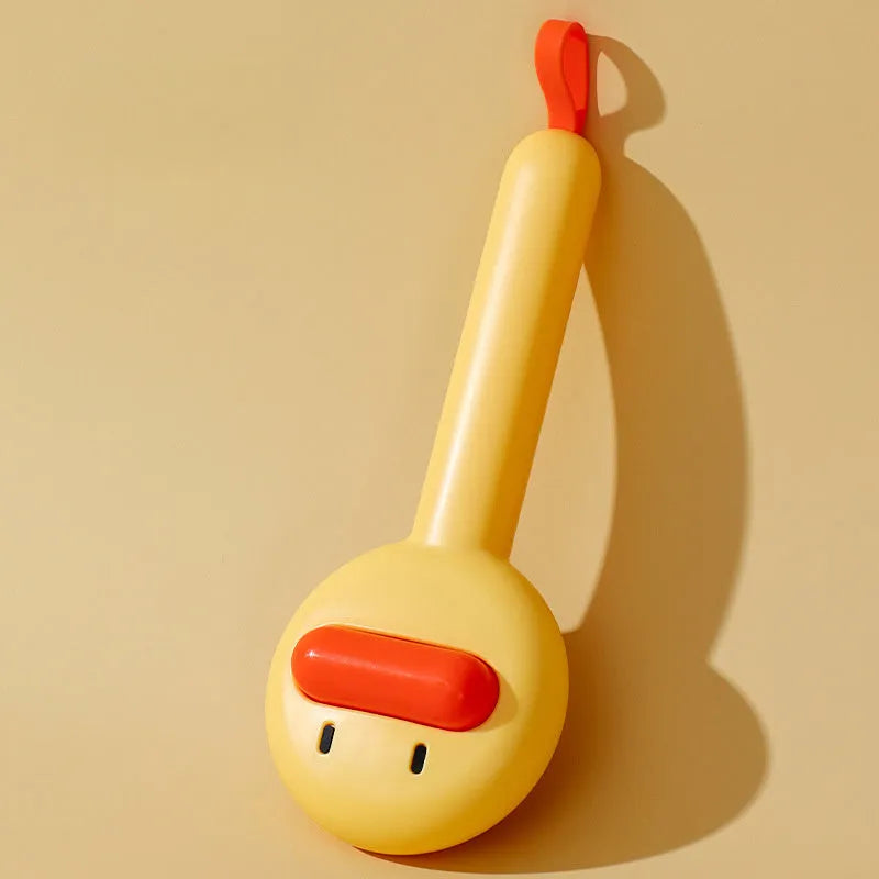 Yellow duck-shaped pet comb with open-section design and floating needle teeth for cat and dog grooming
