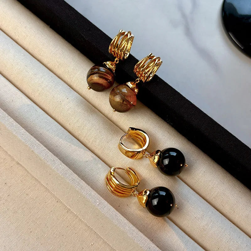 Gold plated geometric drop earrings with round brown tigereye stone, French retro style.