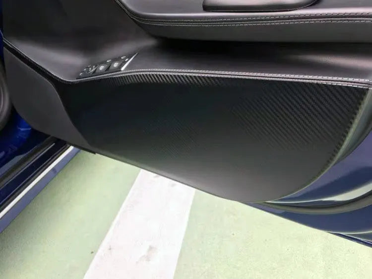 Four-piece carbon fibre protective film for Tesla Model S car door panels