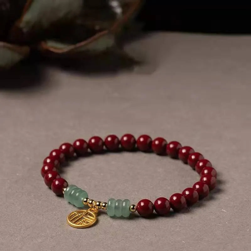 Handmade cinnabar bracelet with copper bead accent in wave shape, unisex design, available in pumpkin or brand cinnabar