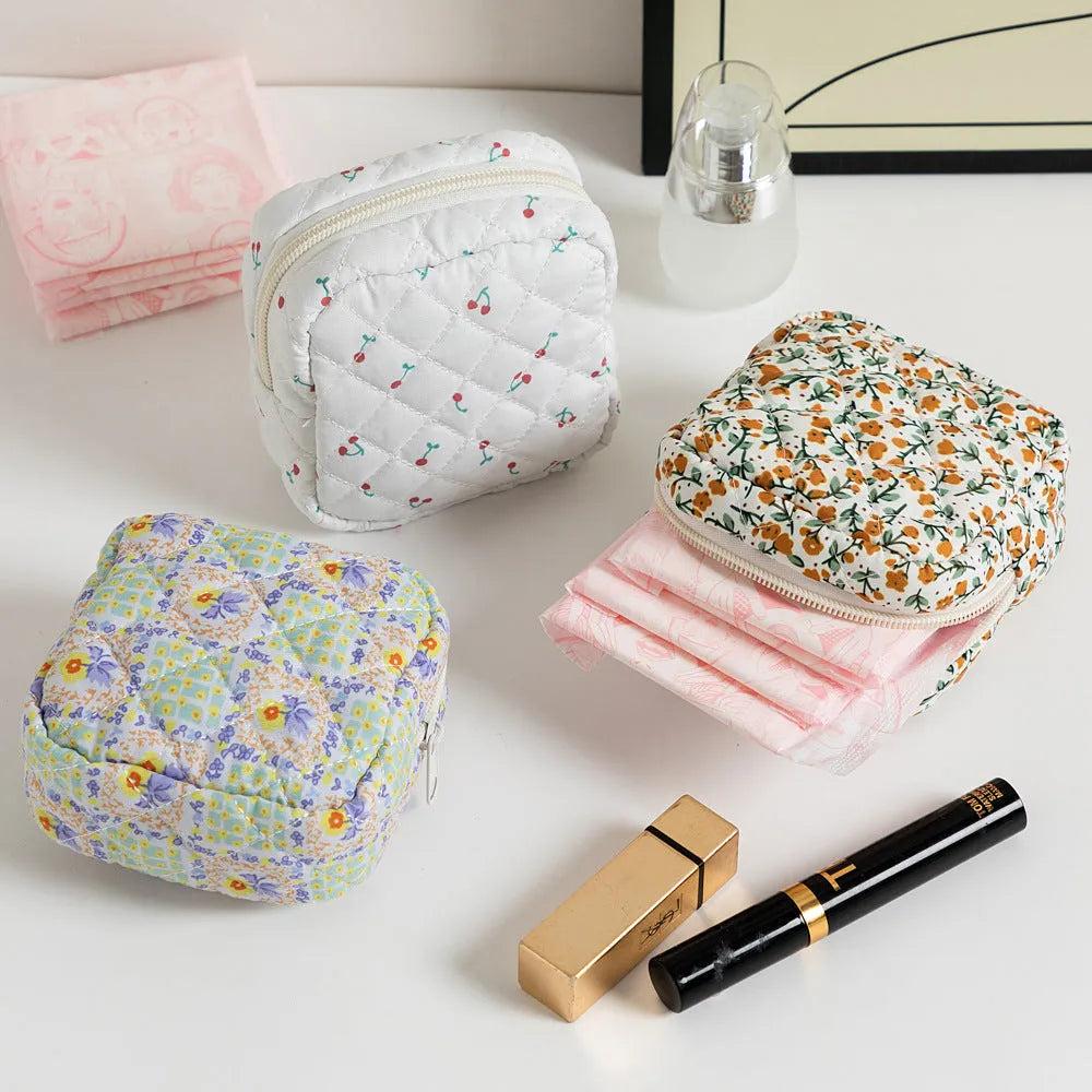 Yellow floral print polyester women's key storage bag with sewing thread details