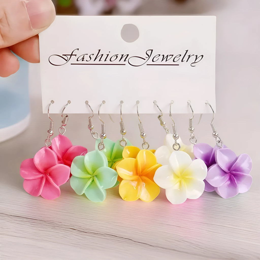 Handmade Plumeria Rubra resin earrings in eight colours including blue and pink, lightweight floral design for pierced ears