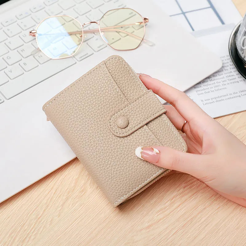 Women's lychee pattern solid colour PU short wallet with sewing thread detail in beige