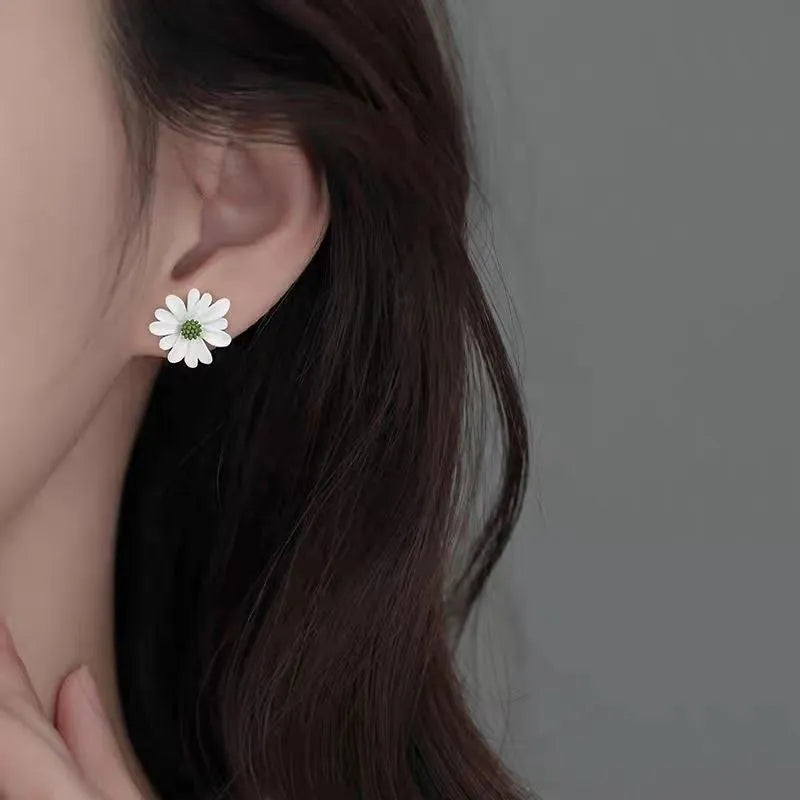 Cartoon flower alloy stud earrings in blue and orange, white and green, or yellow and white two-tone colours