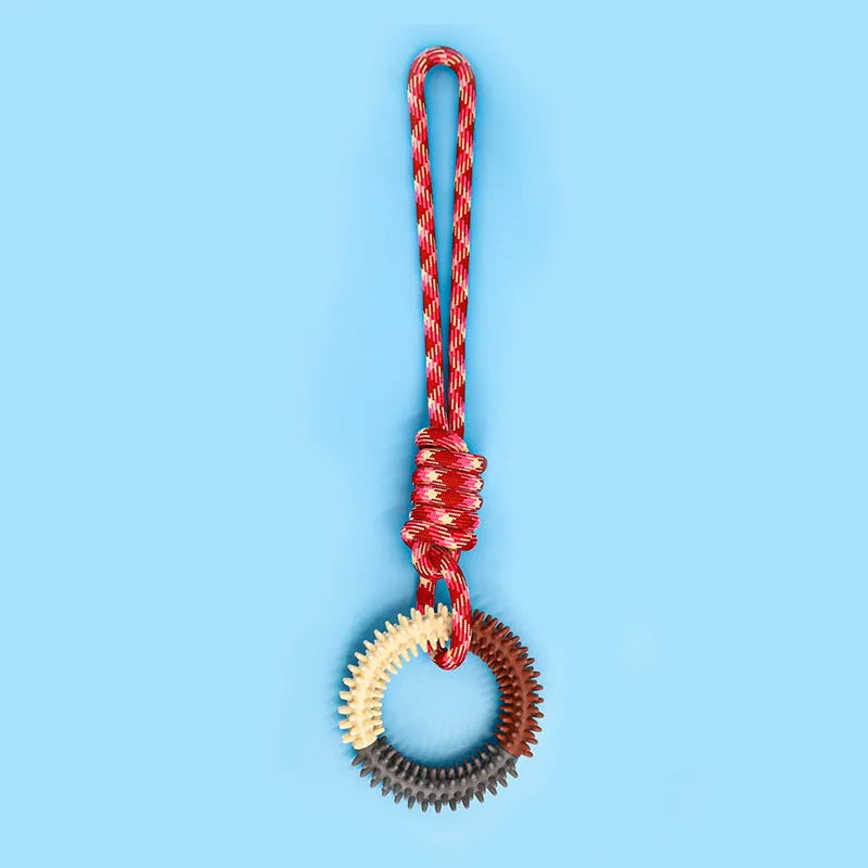 Blue braided rope dog toy with knots, shown next to a red and a rose red version for size comparison.