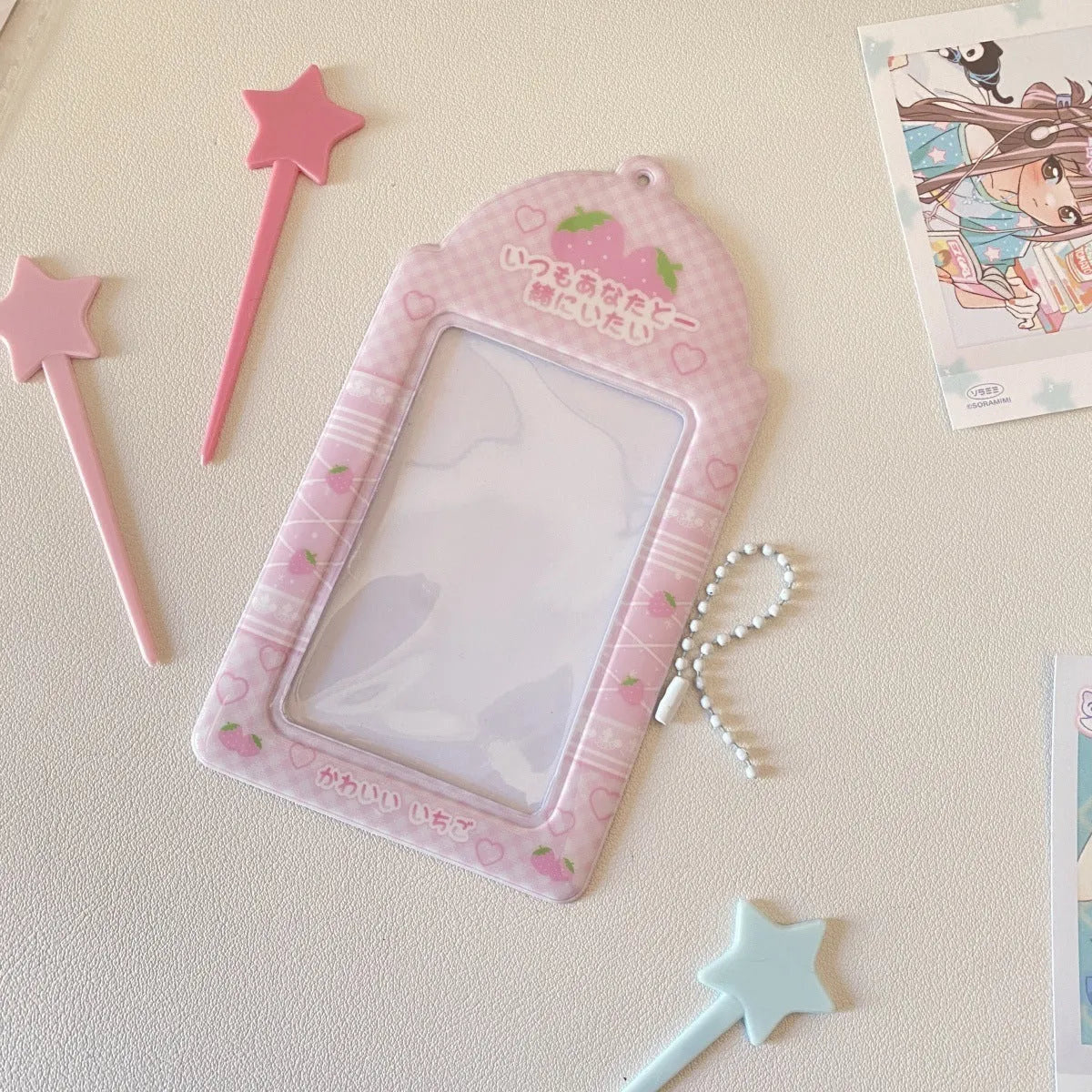 Cartoon strawberry or four-leaf clover PVC meal card holder measuring 7.6cm by 13.6cm