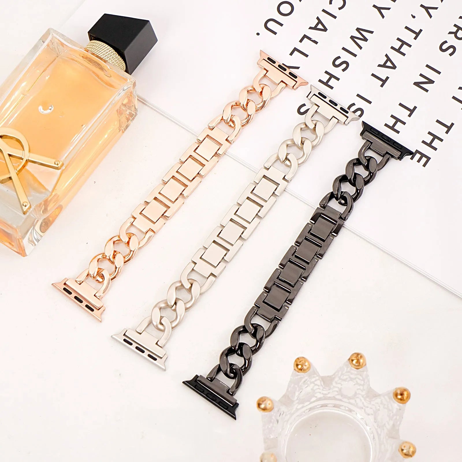 Metal chain link watch strap for Apple Watch in silver, black, gold, rose gold, or Starlight colour.