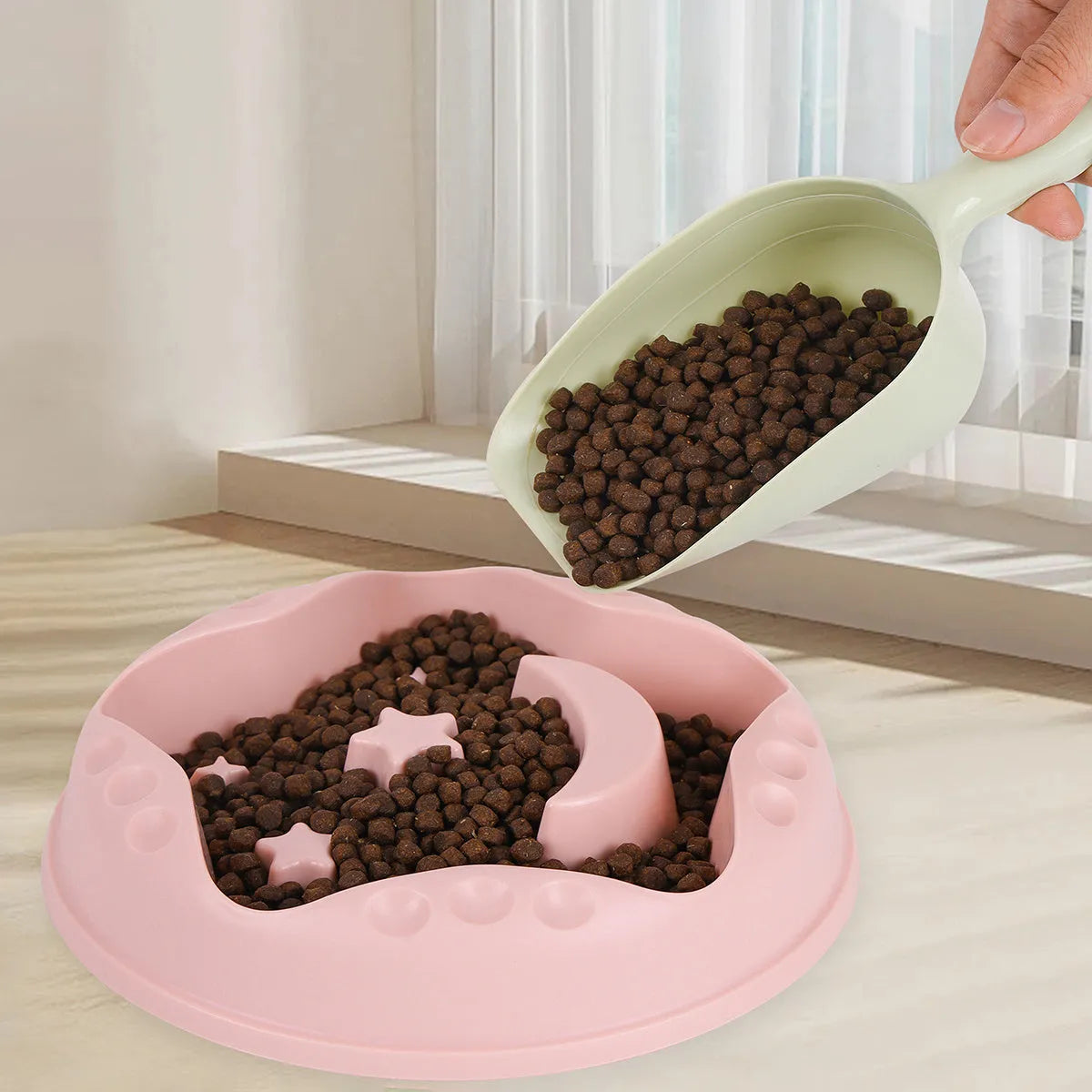 Moon Star Wings slow feeder dog bowl in blue colour with raised centre and non-slip base.
