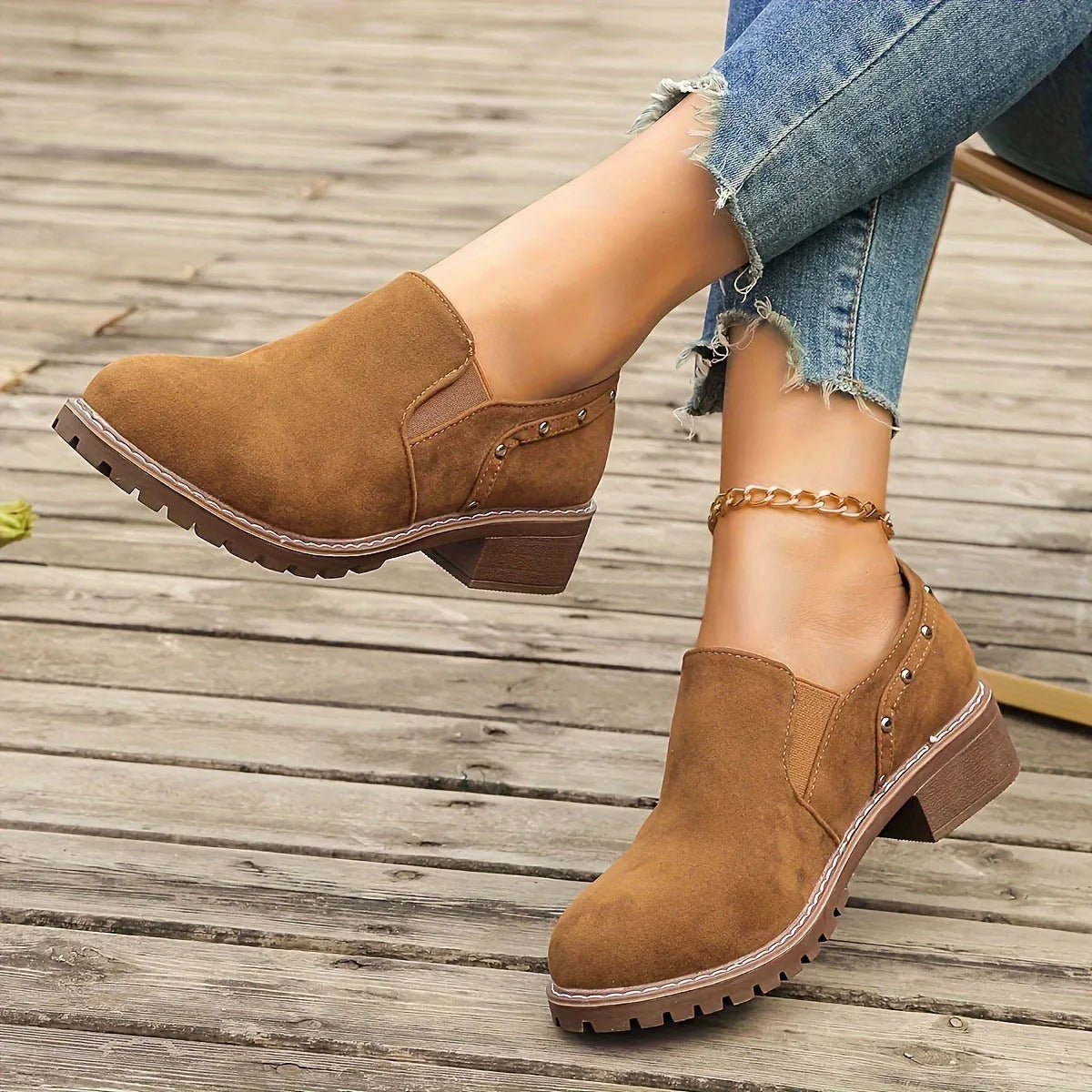 Plus size women's suede ankle boots with low heel, round toe, and elastic band in black
