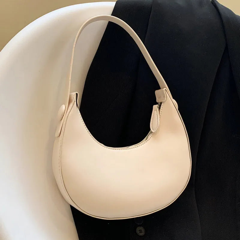Women's retro dumpling-shaped shoulder bag in PU leather with zipper compartment interior