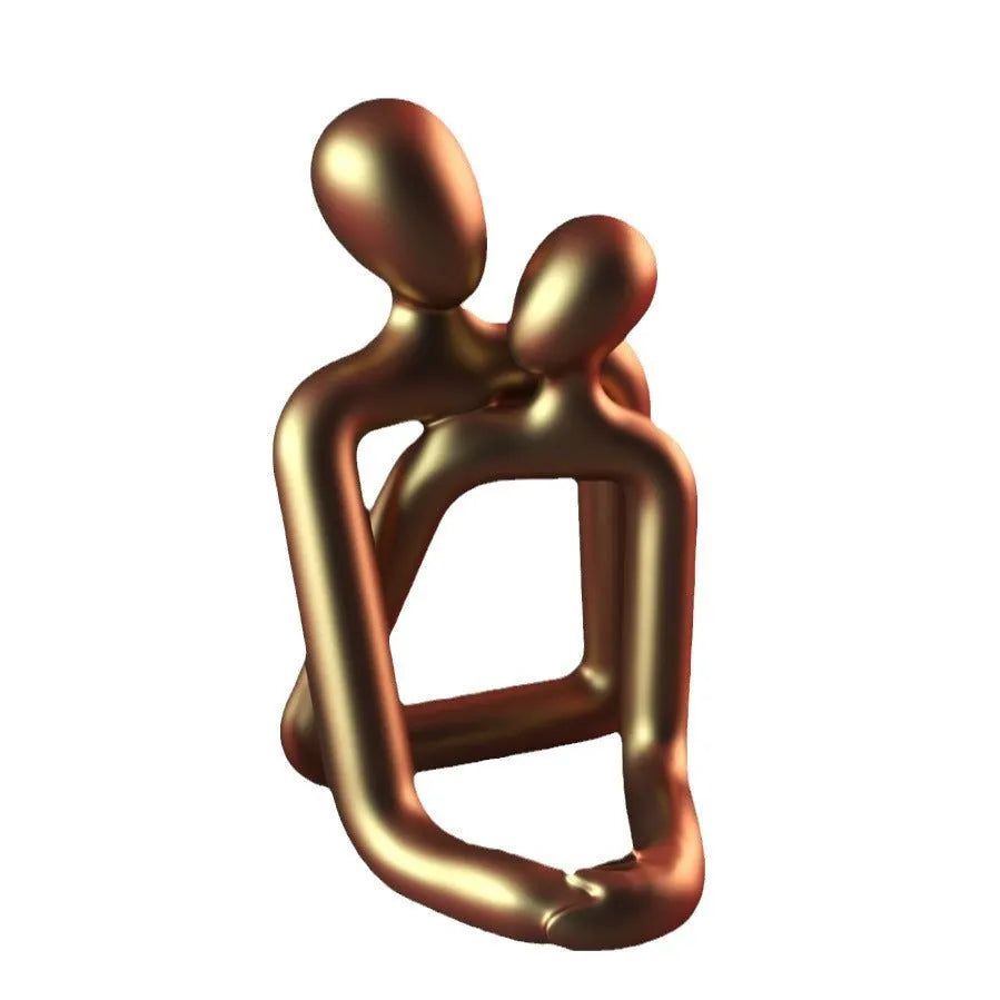 Modern resin sculpture of an embracing couple, available in milky white or gold, for shelf or desk decor.