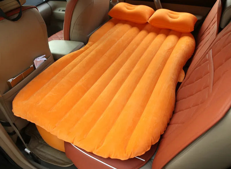 Car inflatable bed with ultra-thickened 0.5mm flocking cloth in Black Wave colour, shown inflated in rear of five-seater car