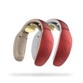 Small handheld intelligent cervical massager in red or white with battery and computer controls.