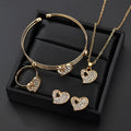 Women's gold alloy jewellery set with earrings, necklace featuring love pendant, and matching bracelet