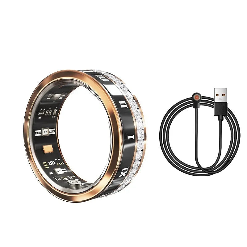 Gold and silver smart ring with diamond inlay on a finger, showing charging cable and box