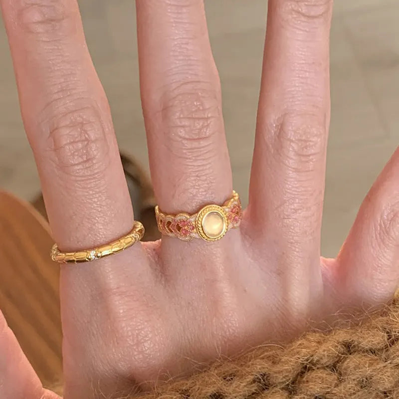 Open geometric ring with pink crystal enamel on copper gold plating for women