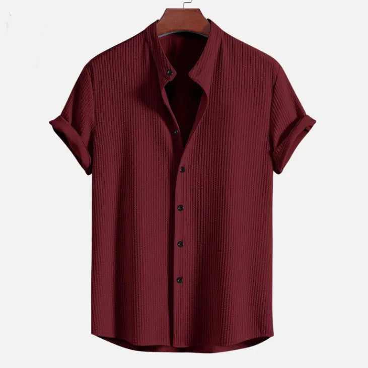 Men's loose short sleeve polyester shirt in wine red colour showing front view