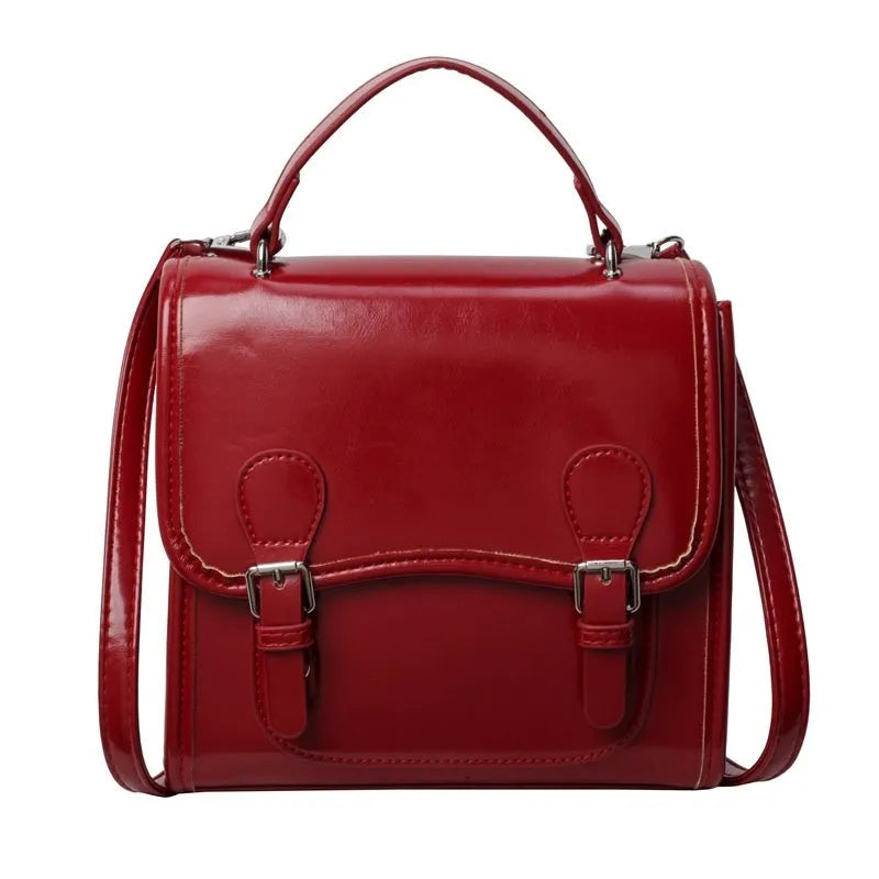 New simple college-style all-matching PU backpack in black with sewing thread detail