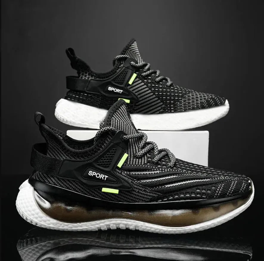 Men's casual sneaker with woven mesh upper in black colour showing round toe and lace-up design
