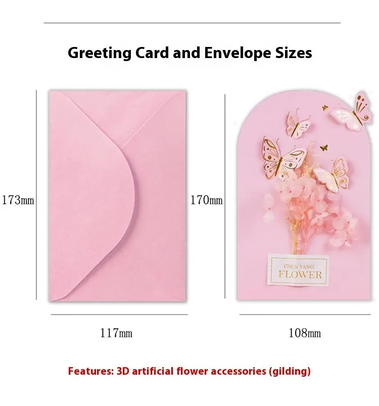 Handmade 3D boxed birthday card with butterfly shape and artificial flowers on coated paper.