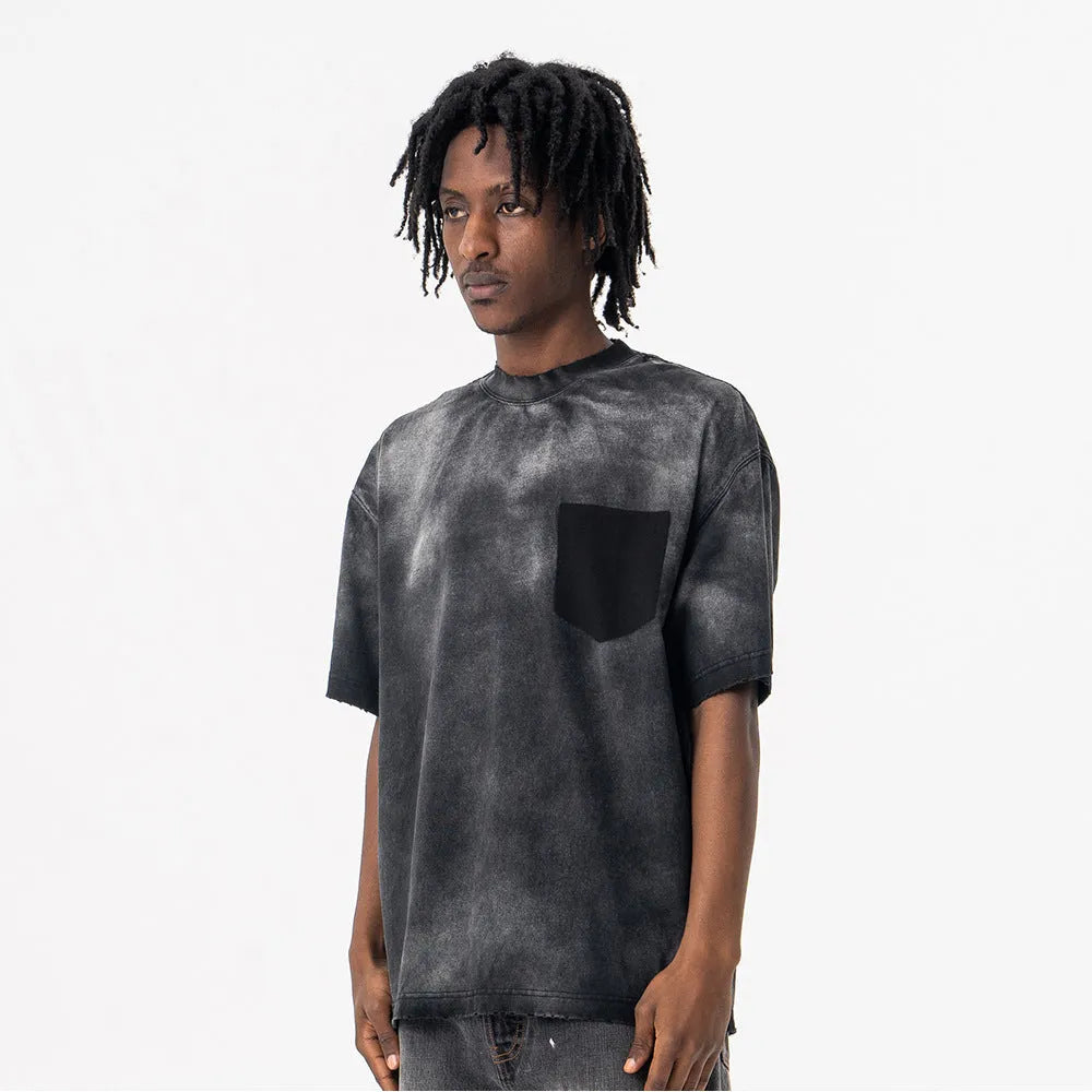Black men's loose fit graphic t-shirt with drop shoulder sleeves on mannequin