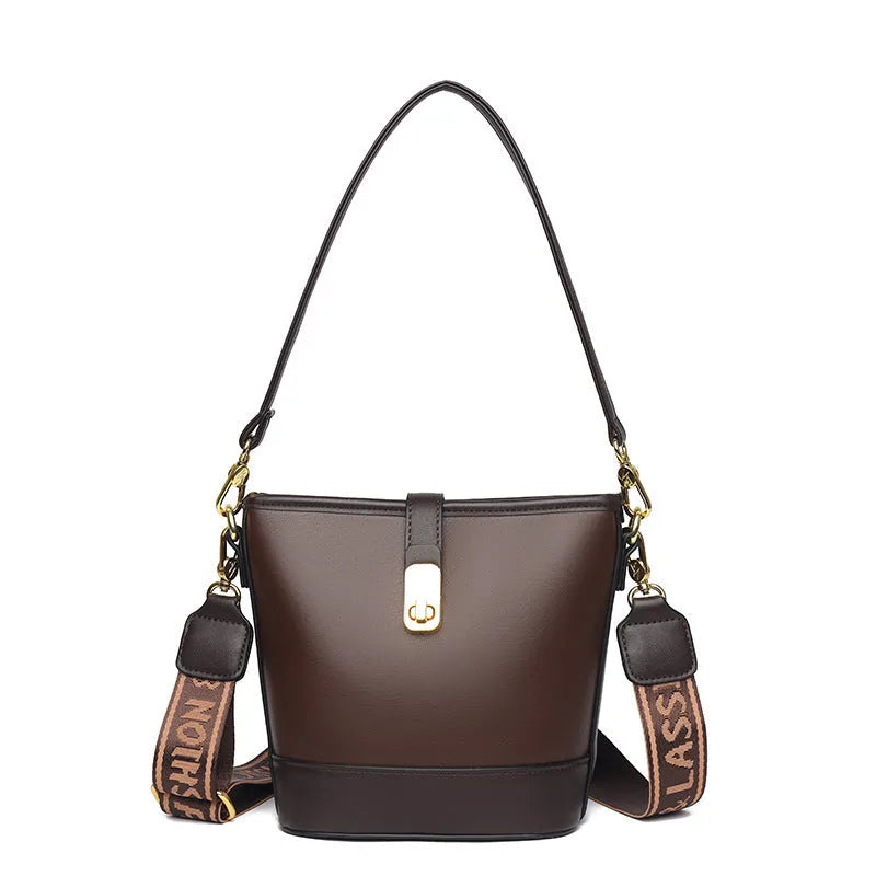 Korean style black bucket messenger bag with double shoulder straps and multiple interior compartments