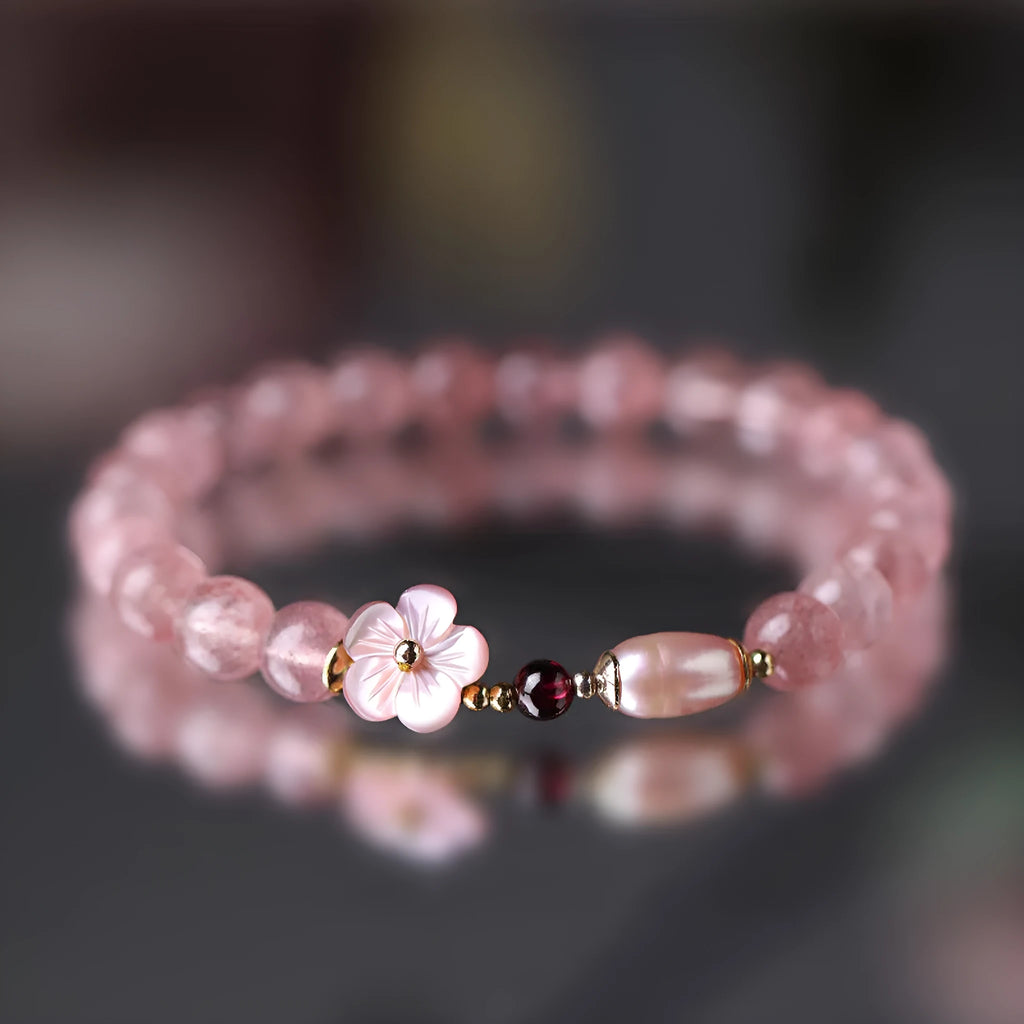 Strawberry quartz crystal bracelet with peach blossom flower charm and adjustable clasp
