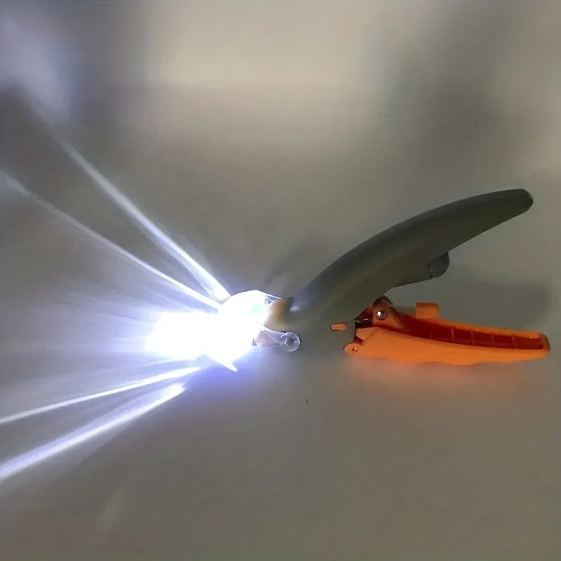 Yellow LED pet nail trimmer with magnifying glass for dogs and cats on a white background.