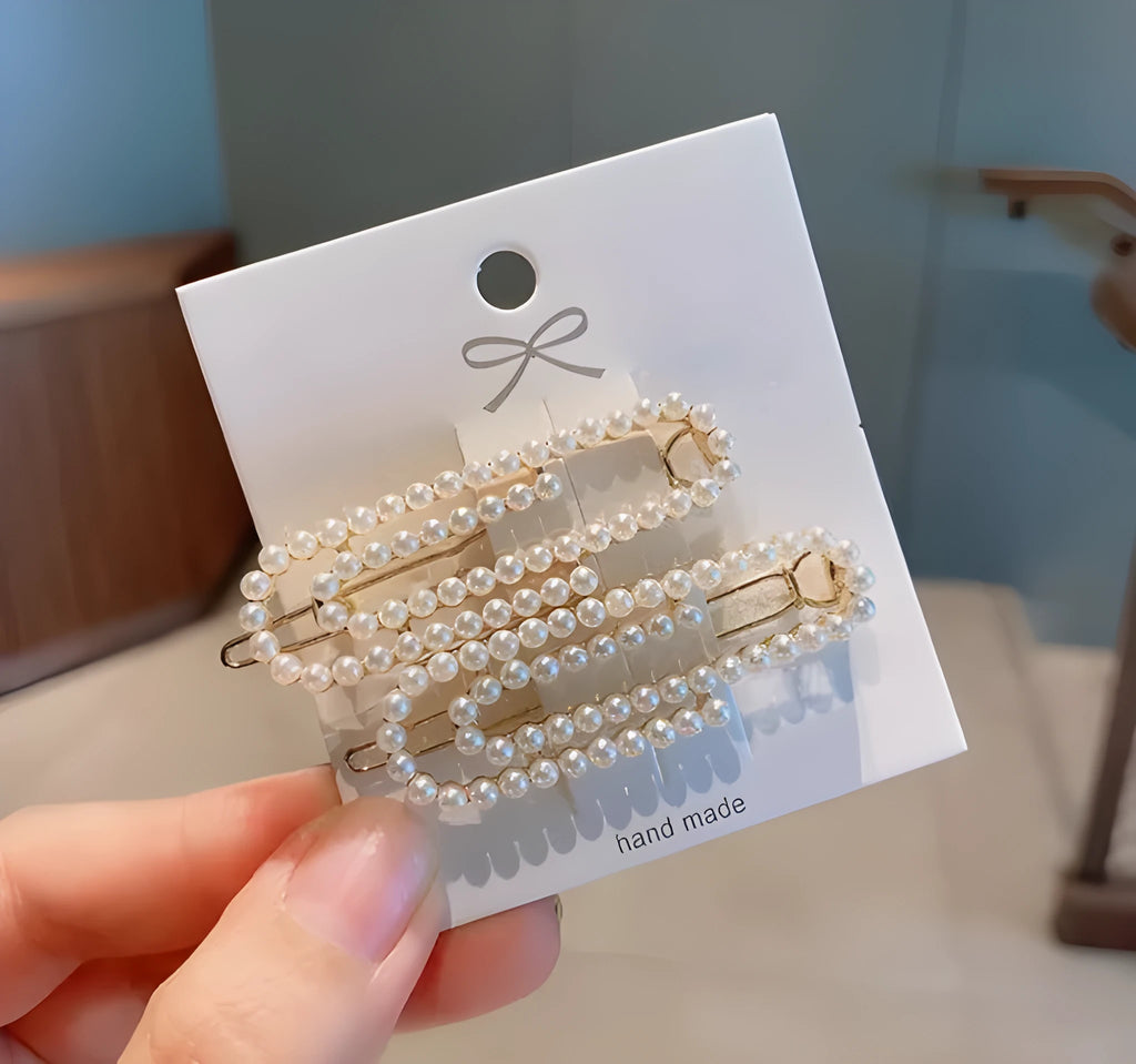 White pearl hair clip set with geometric weaving pattern on metal acrylic base