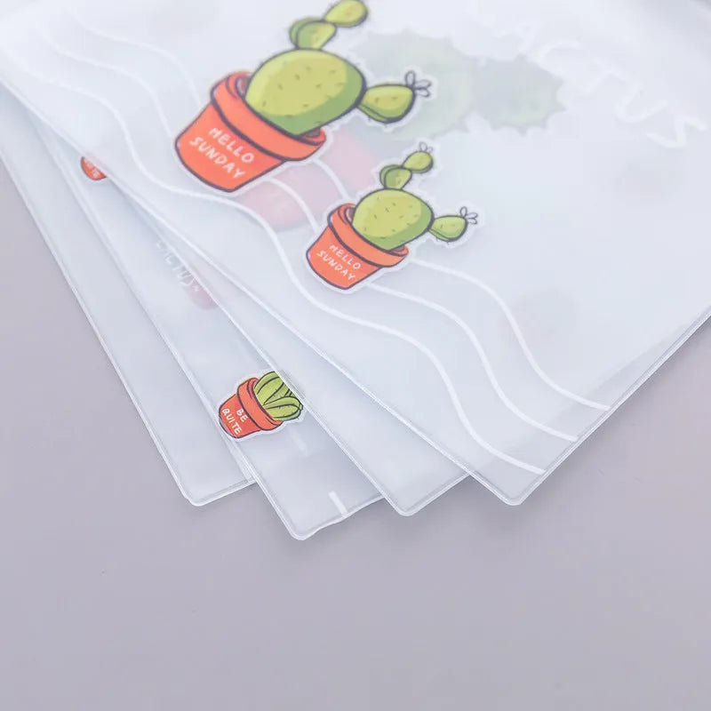 PVC pencil case with sealed closure, cactus print, 17.1x21.2cm, on a desk with stationery