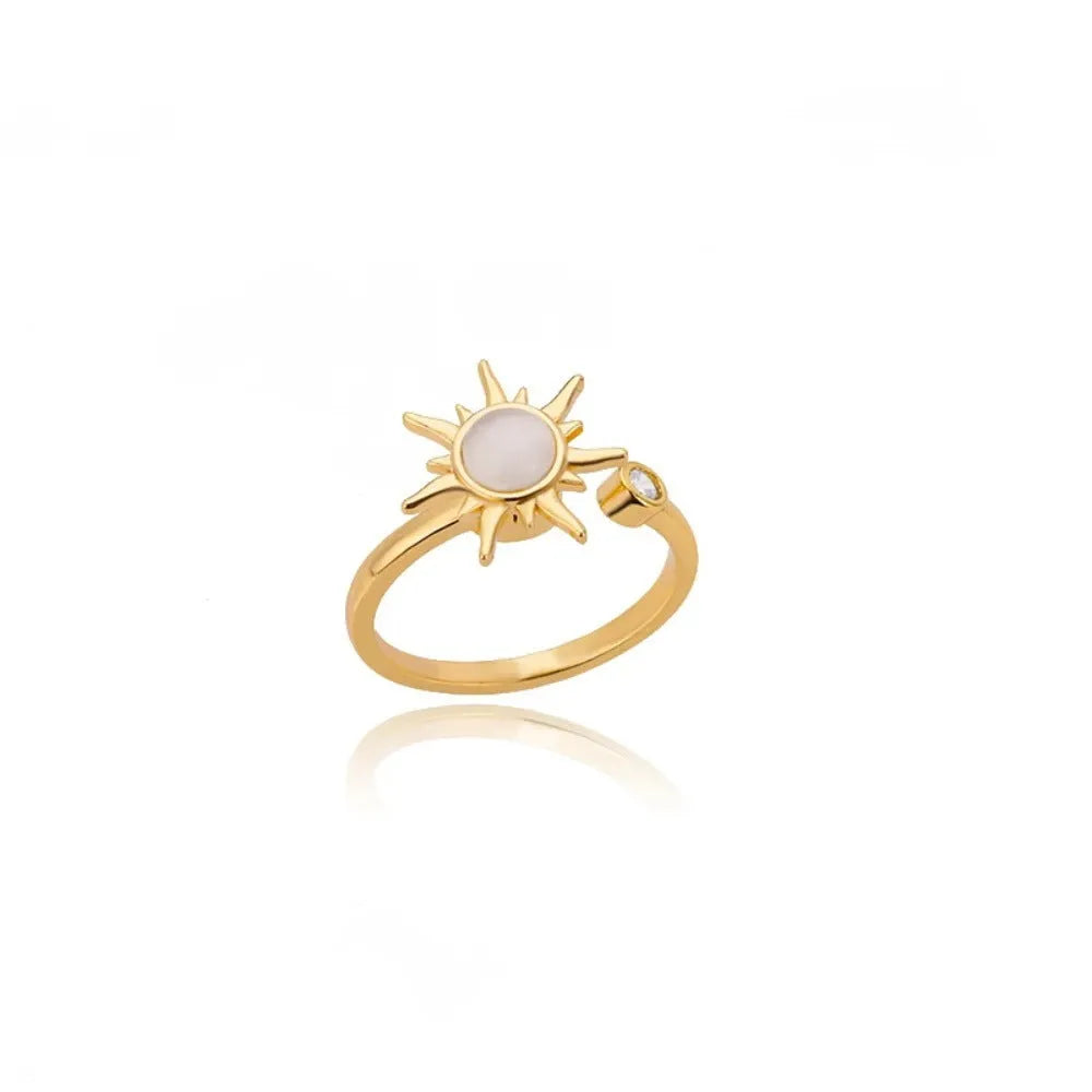 Simple geometric decompression ring with adjustable opening in gold electroplated finish
