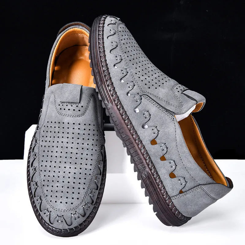 Men's brown slip-on leather casual shoes with round toe and visible stitching details
