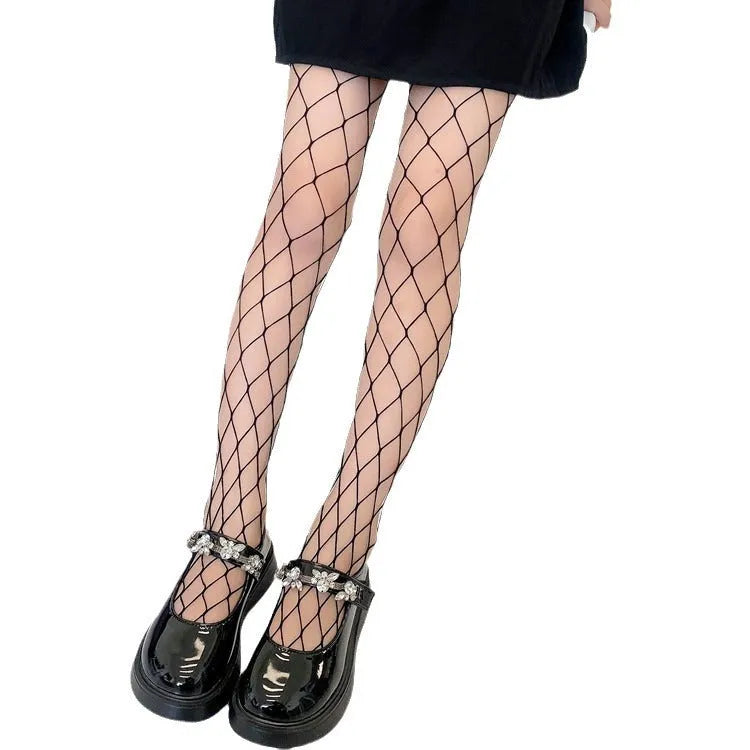 Women's mesh stockings showing large net, medium net and small net patterns in black and white colours