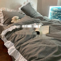 Linen washed cotton Mori style bedding four-piece set in solid colours showing quilt cover, sheet, and pillowcases