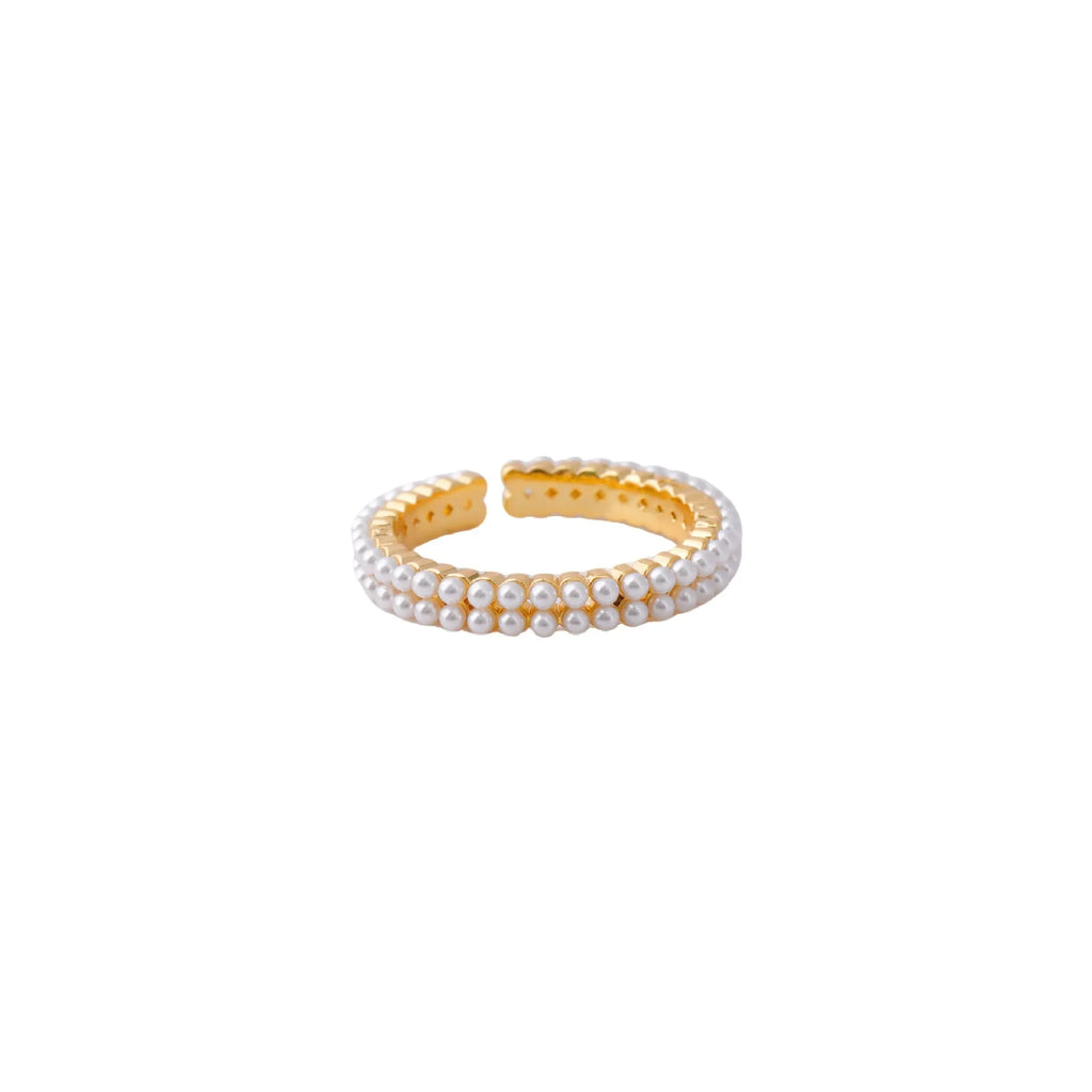 Gold geometric open mouth women's ring with round pearl design elements on copper base
