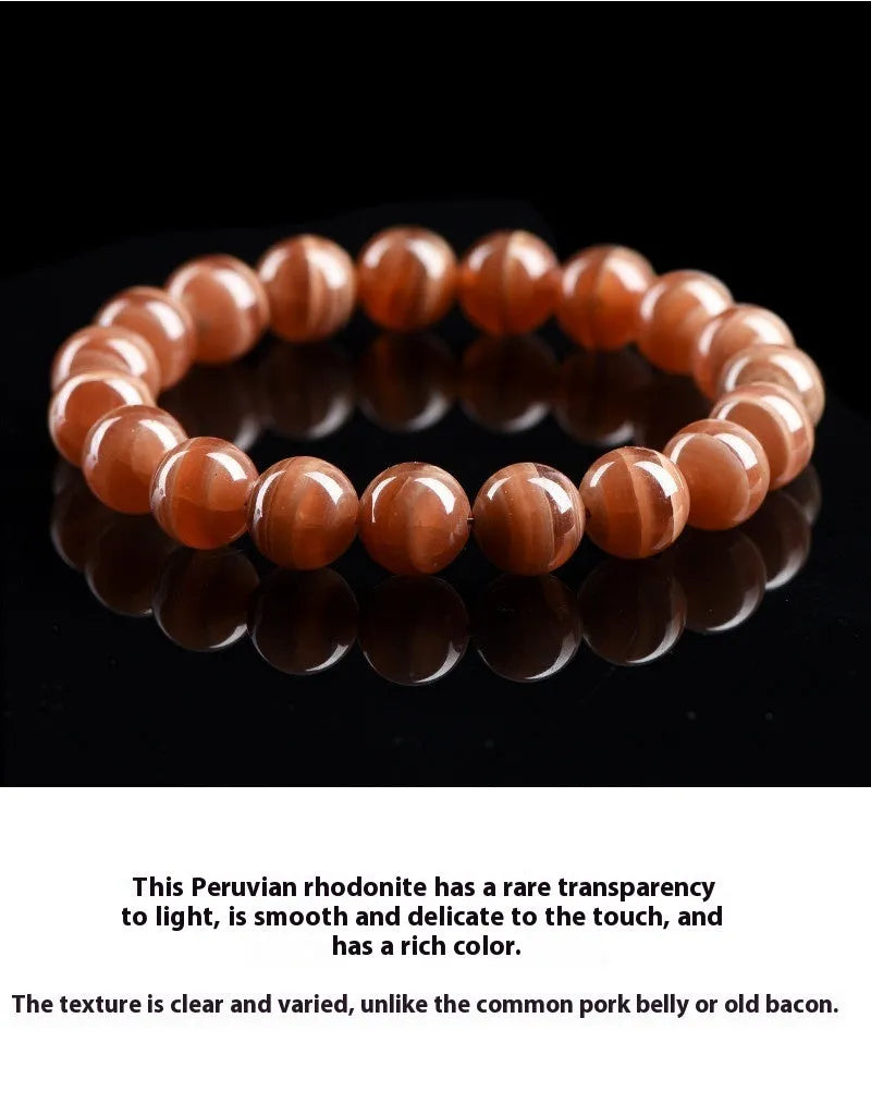 Natural Peruvian rhodochrosite bead bracelet with geometric design and ruyi element